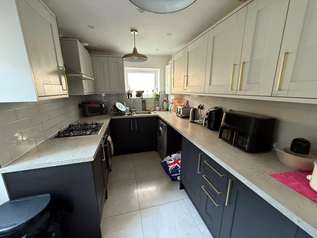 Lot: 140 - WELL PRESENTED RESIDENTIAL INVESTMENT - Kitchen with access to garden
